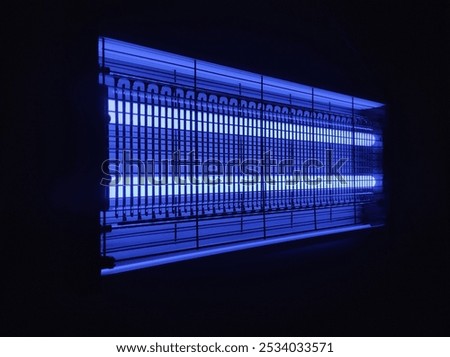 Close up Electronic blue light insect killer. Modern electronic mosquito killer lamp.