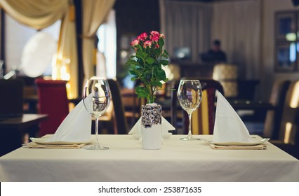 Close Up Elegant Tabletop Setting Design For Two People Inside An Expensive Restaurant