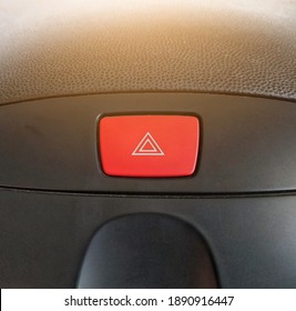 Close Up Emergency Light Button In A Red Car 