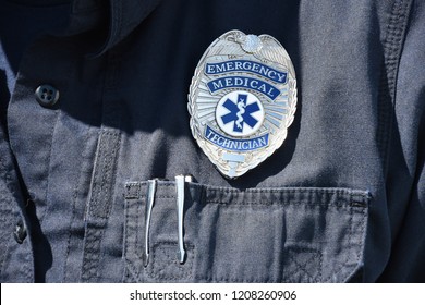 Close up of an emergency medical technician badge