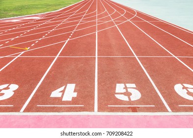 Close up empty athletic running track with number in stadium