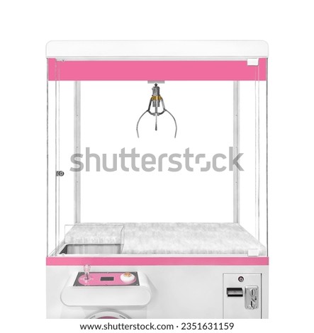 Close up empty large white claw machine decorated with pastel pink isolated on white background