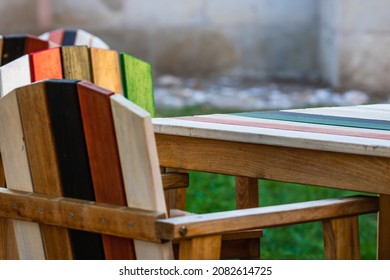 Close Up Of An Empty Table With Empty Chairs At A Local Outdoor Restaurant