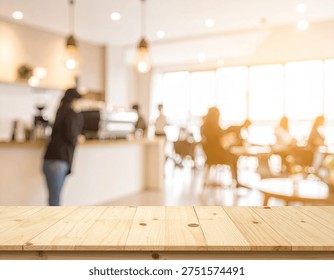 Close up of empty wooden table with blurred modern cafe interior and people in background