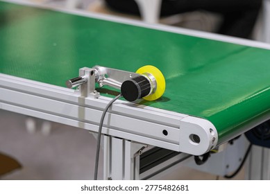 Close up of encoder testing device on factory production line