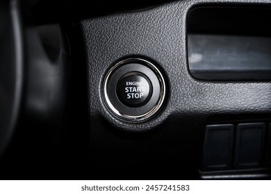 Close up engine car start button. Start stop engine modern new car button,Makes it easy to turn your auto mobile on and off. a key fob unique ,selective focus	