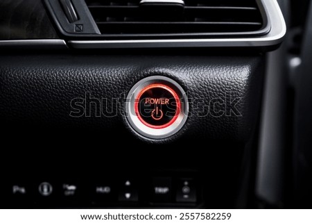 Close up engine car start button. Start stop engine modern new car button,Makes it easy to turn your auto mobile on and off. a key fob unique ,selective focus