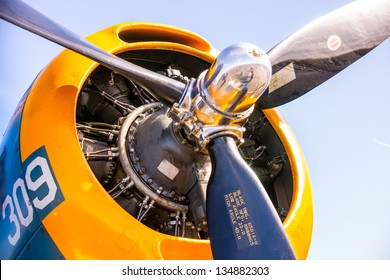 Close up of the engine, hub, cowling and propeller of a vintage World War II era airplane. - Powered by Shutterstock