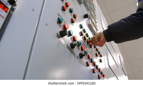 close up of engineer hand presses button on modern control panel in operating room of industrial factory - Powered by Shutterstock - Get 15% off with code: PIKWIZARD15