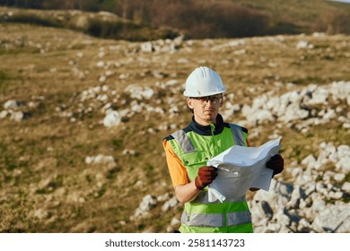 Close up of an Engineer Reviewing Project Papers for the Construction of Wind Turbines 