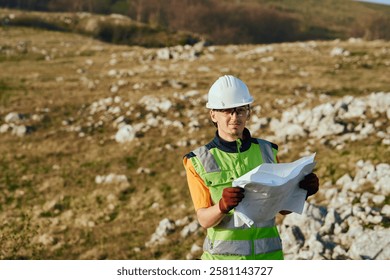 Close up of an Engineer Reviewing Project Papers for the Construction of Wind Turbines 
