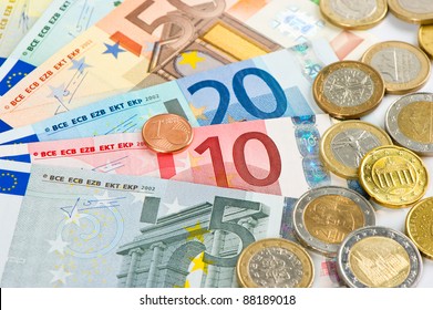 Close Up Of Euro Currency. Coins And Banknotes. Money Background