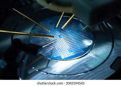 Close Up Of Examining Test Sample Of Microchip. Microchip Under Microscope. PCB Transistor In Laboratory. Equipment For Testing Microchips. Testing During PCB Production. Manufacturing Of Microchips.