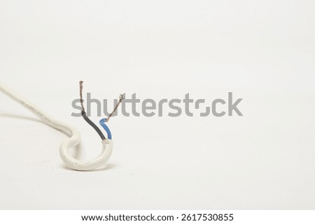 Close up of exposed electrical wire cable isolated on white background.Copy space for text.For graphic design,3D rendering and banner background