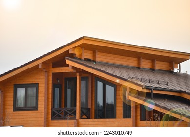 Close Up Of Exposed House Siding During Home Remodel With Shingles Removed In Suburban Contractor Construction Work Site. Natural Photo.