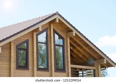 Close Up Of Exposed House Siding During Home Remodel With Shingles Removed In Suburban Contractor Construction Work Site. Natural Photo.