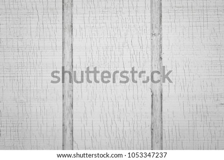 Close Up of an Exterior White Wood Wall with Cracked Paint