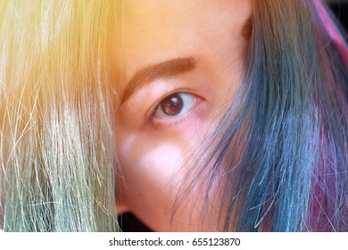 Close Up The Eye Of Beautiful Asian Woman With Colorful Hair Color, Vintage Style, Blur Picture For Background