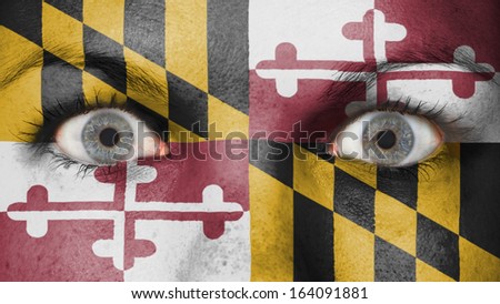 Close up of eyes. Painted face with flag of Maryland