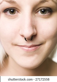 Close up of a face with piercing