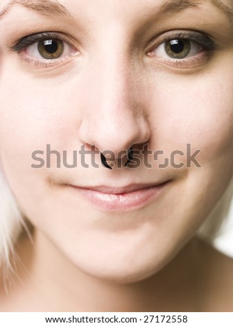 Close up of a face with piercing