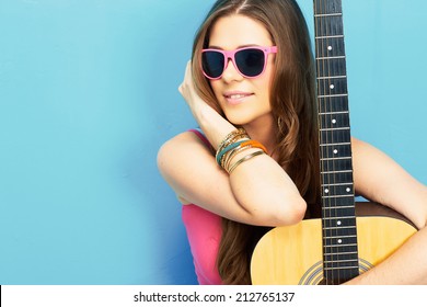 Close Up Face Portrait Of Young Woman With Guitar . Modern Style Portrait Of Happy Woman Singer