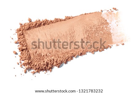 close up of face powder on white background