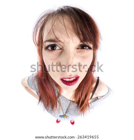 Close up Face of a Worried Young Woman with Brown Hair, Looking at the Camera, Isolated on White Background.