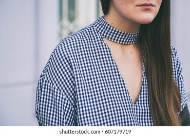 Close Up Fashion Details. Woman Wearing A Gingham Checked Top. Ideal Spring Outfit Accessories.fashion Blogger Posing On The Street


