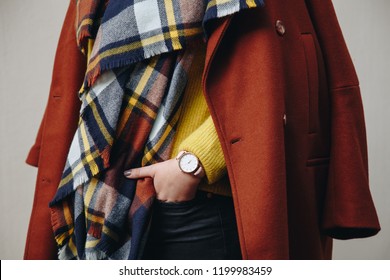 Close Up Fashion Details, Young Fashion Blogger Wearing Modern Wrist Watch And A Brown Double Breasted Coat With A Check Scarf. Ideal Fall Outfit Accessories.