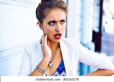 Close Up Fashion Lifestyle Portrait Of Sexy Woman With Bright Make Up, Posing On The Street, Angry Surprised Emotions.