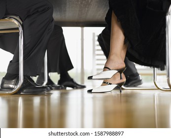 533 Feet under table Images, Stock Photos & Vectors | Shutterstock