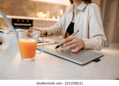 Close Up Of Female Designer Works In Home Office Drawing On Graphic Tablet. Freelancer Working On Project, Watching Movie On Computer, Studying, Blogging, Relaxing And Chatting Online