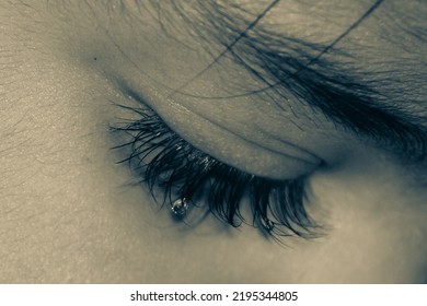 close up of female eye with makeup with tear drop on it bride - Shutterstock ID 2195344805