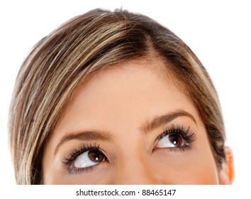 Close Up Of Female Eyes Looking Up - Isolated Over A White Background