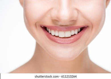 Close Up Of Female Face With Toothy Big Smile Isolated On White