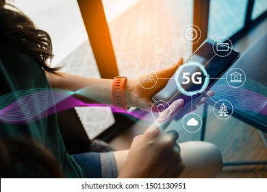 Close up of female hand holding a phone with a 5G hologram in coffee shop. 5G network wireless systems.The concept of 5G network, high-speed mobile Internet, new generation networks. - Shutterstock ID 1501130951