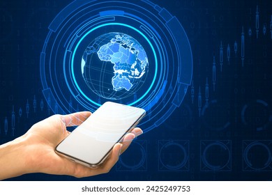 Close up of female hand holding white mock up smartphone with holographic screen with digital globe interface and business chart on blurry blue background. HUD, international stock and future concept - Powered by Shutterstock