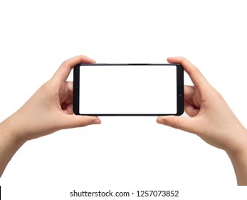 Close Up Of Female Hands Holding Horizontal Mobile Smart Phone With White Blank Screen Isolated On White Background. Mock Up. Copy Space.