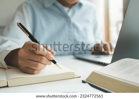 Close up female hands using computer laptop for searching , learning , working online. 