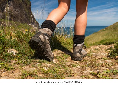 Close Up Female Hiker Shoes Walking On Trail