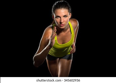 Close Up Of Female Jogger Sprint Runner Determined Athlete Start Of Race Training Fitness Cardio Cross Fit