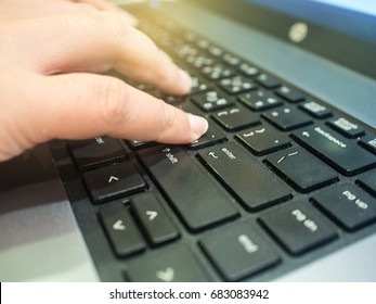 close up female's finger pushing enter button on laptop keyboard. - Shutterstock ID 683083942