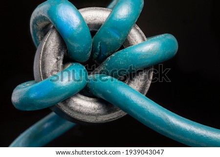 Close up of a ferrite bead inductor. An electrical element that suppresses high-frequency electronic noise in electronic circuits.