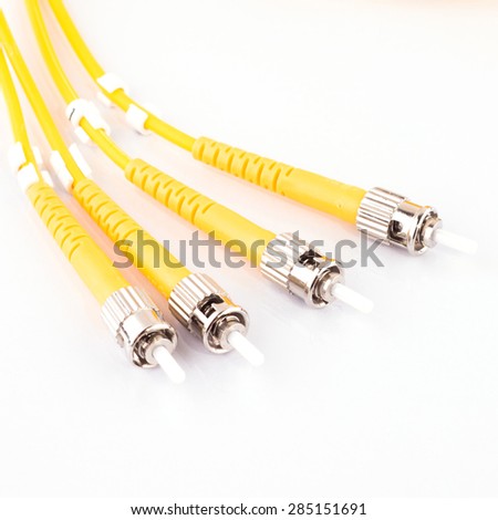 Close up of a fiber optic patchcord over white background