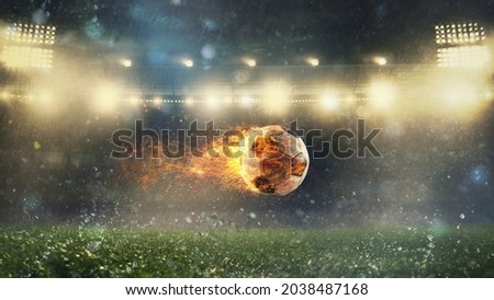 Close up of a fiery soccer ball kicked with power at the stadium