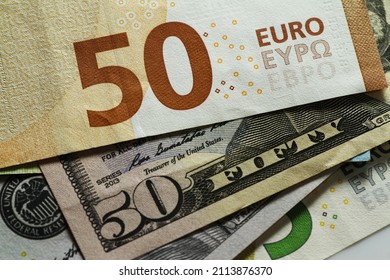 Close up of Fifty Euro and Fifty United States Dollar