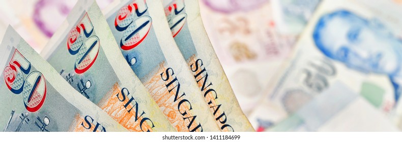  Close Up Of Fifty Singapore Dollar On Many Singapore Money Blur Background