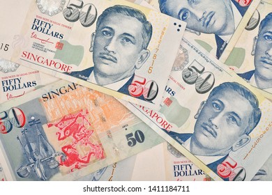 Close Up Of Fifty Singapore Dollar On Many Singapore Money Background 