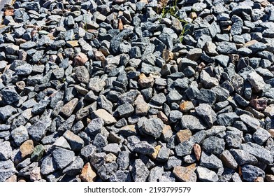 Close Up Of Finely Broken Pebbles Rubble Texture Background, Day In Sunlight